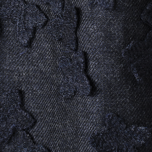 Allover superpose flower embroidery on light wool melange base