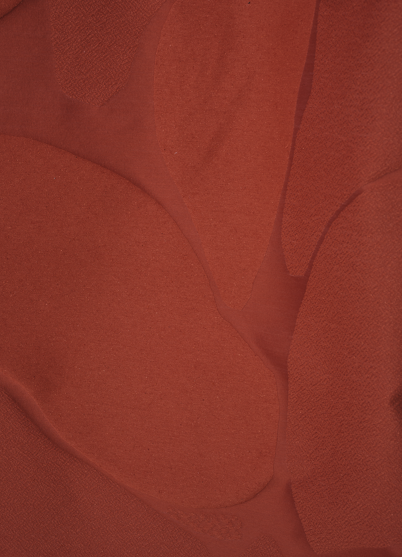 Multi-textured surface with allover design inspired by stones