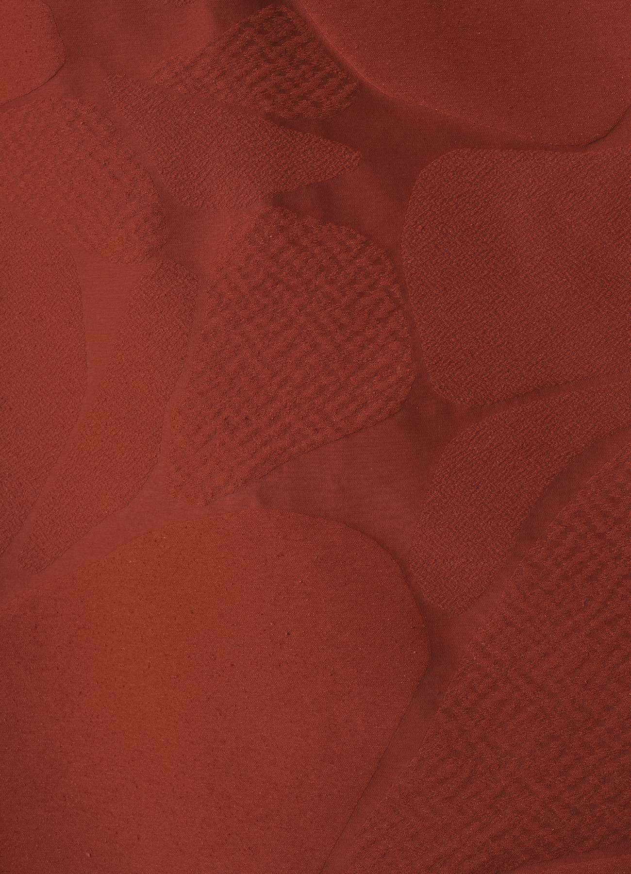 Multi-textured surface with allover design inspired by stones