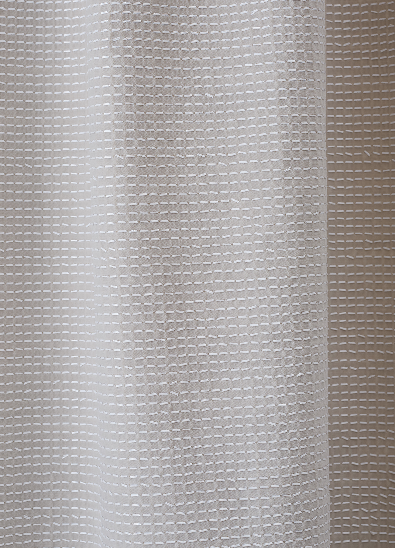 Allover scroll sequin embroidery on velvet base fabric