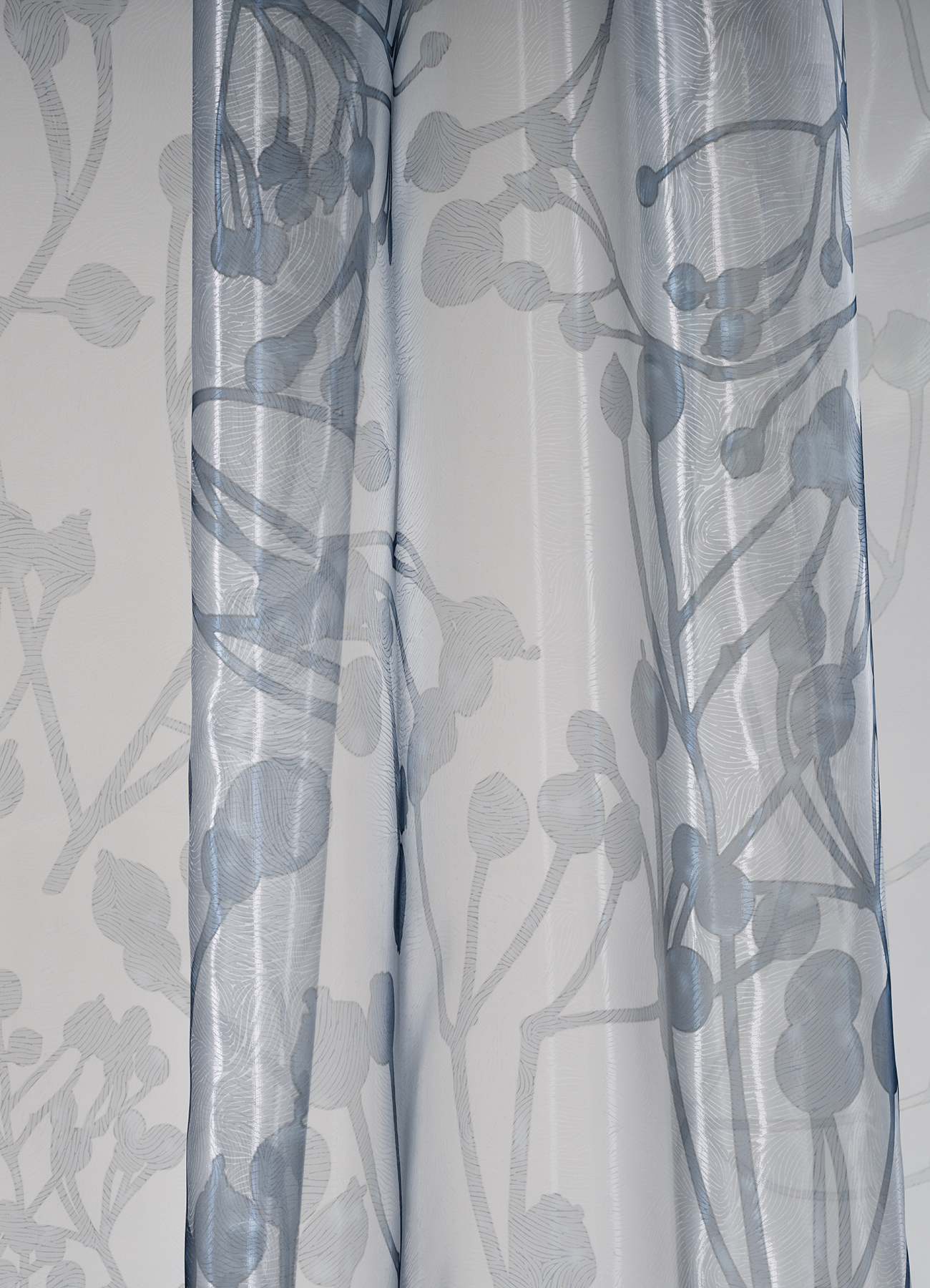 Embossed sheer fabric with metallic shine, with botanical allover print