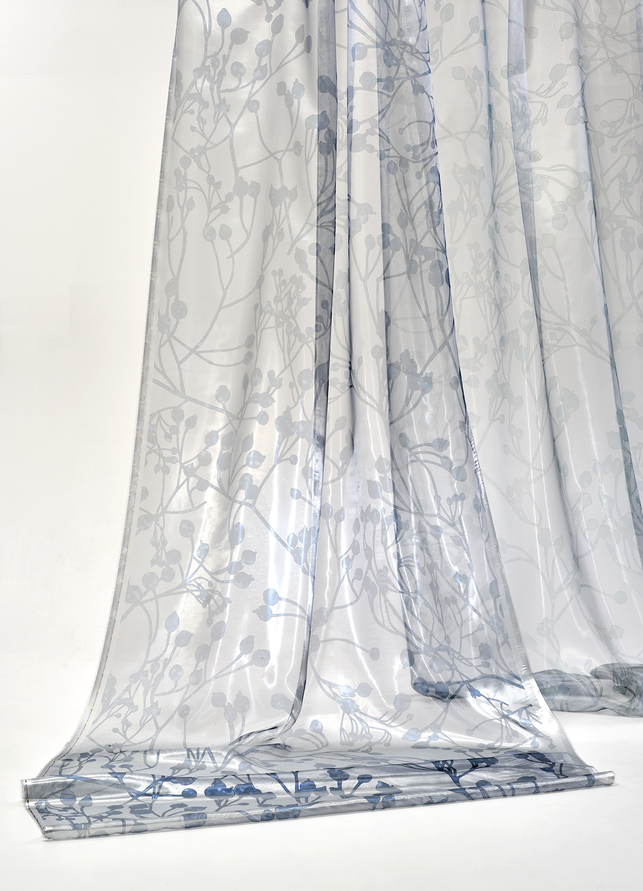 Embossed sheer fabric with metallic shine, with botanical allover print