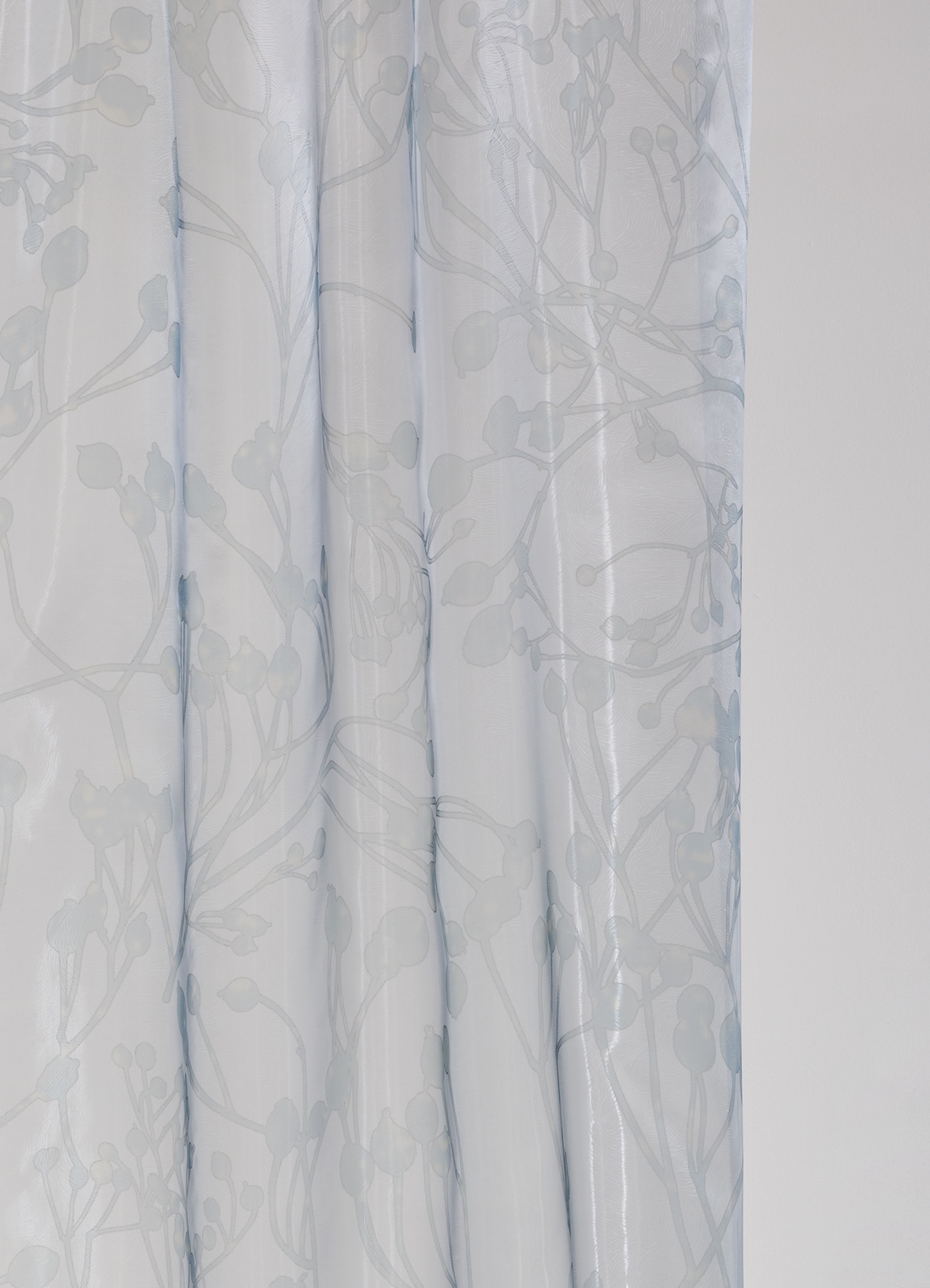 Embossed sheer fabric with metallic shine, with botanical allover print