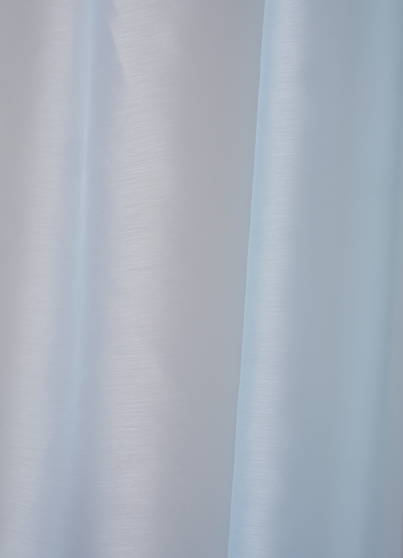 Fire retardant polyester voile with fine texture