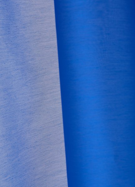 Fire retardant polyester voile with fine texture